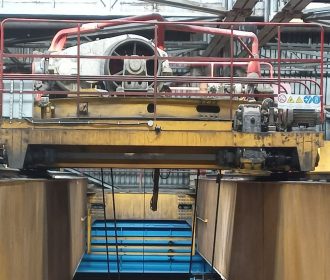 Marvelmind Industrial Super-Beacon installed on the crane's cart for precise Y tracking