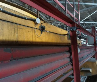 Industrial Super-Beacon installed on the crane's cart for precise Y tracking